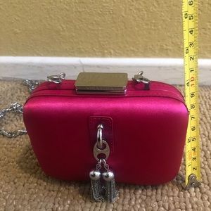 Perfect for a night out with the girls or date night! Pink Satin purse